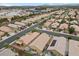 Expansive aerial view of a suburban neighborhood showcasing single-Gathering homes with well-maintained landscaping and neighborhood streets at 4062 Vulcan St, Las Vegas, NV 89122