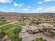 Stunning aerial view of the Stallion Mountain Golf Club community, showcasing lush green golf courses and beautiful homes at 4062 Vulcan St, Las Vegas, NV 89122