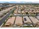 Residential neighborhood featuring uniform houses and well-maintained streets and landscaping at 4062 Vulcan St, Las Vegas, NV 89122