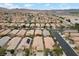 Planned community featuring well-maintained homes, streets, and landscaping in desert setting at 4062 Vulcan St, Las Vegas, NV 89122