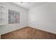 Cozy bedroom with carpet, a window, and bright white walls at 4062 Vulcan St, Las Vegas, NV 89122