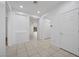Bright entryway featuring tile flooring, neutral walls, and modern recessed lighting at 4062 Vulcan St, Las Vegas, NV 89122