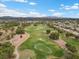 Aerial view of the lush Stallion Mountain Golf Club showing off the green golf course and mature landscaping at 4062 Vulcan St, Las Vegas, NV 89122
