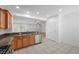 Kitchen view showcases stainless steel appliances and access to adjacent living area at 4062 Vulcan St, Las Vegas, NV 89122
