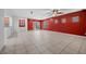 Bright, open living room featuring tile floors, and a sliding glass door at 4062 Vulcan St, Las Vegas, NV 89122