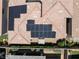 Close up aerial view of a home's roof showcasing modern solar panels and sleek design at 417 Honeybrush Ave, Henderson, NV 89011