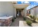 Inviting entryway with brick-paved walkway and decorative accents at 417 Honeybrush Ave, Henderson, NV 89011