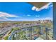 Enjoy expansive city views from this balcony, with clear blue skies and palm-lined streets creating a serene escape at 4381 W Flamingo Rd # 901, Las Vegas, NV 89103