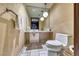 Modern bathroom features marble floors, a vessel sink, and elegant lighting, creating a serene and luxurious space at 4381 W Flamingo Rd # 901, Las Vegas, NV 89103