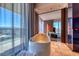 Modern main bathroom showcasing a stylish soaking tub with city views, offering a luxurious and relaxing retreat at 4381 W Flamingo Rd # 901, Las Vegas, NV 89103