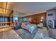 Main bedroom with dark wood accents, plush rug, and city views at 4381 W Flamingo Rd # 901, Las Vegas, NV 89103