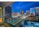 Breathtaking city views from the private balcony of this modern high-rise residence at 4525 Dean Martin Dr # 901, Las Vegas, NV 89103