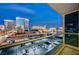Enjoy this spacious balcony offering spectacular views of the Las Vegas strip at night at 4525 Dean Martin Dr # 901, Las Vegas, NV 89103