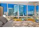 Beautiful bedroom featuring floor-to-ceiling windows showcasing the dazzling city skyline at 4525 Dean Martin Dr # 901, Las Vegas, NV 89103