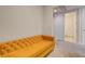 Cozy bedroom space with an inviting yellow couch and neutral walls for a peaceful retreat at 4525 Dean Martin Dr # 901, Las Vegas, NV 89103