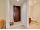 Welcoming entryway featuring a modern front door and convenient access to a well-lit bathroom at 4525 Dean Martin Dr # 901, Las Vegas, NV 89103