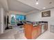 Cozy kitchenette and living area with modern cabinets and skyline views at 4525 Dean Martin Dr # 901, Las Vegas, NV 89103