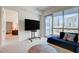 Comfortable living room featuring floor to ceiling windows with skyline views and modern decor at 4525 Dean Martin Dr # 901, Las Vegas, NV 89103