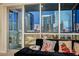 This living space offers an impressive view of the city skyline from the comfort of a modern sofa at 4525 Dean Martin Dr # 901, Las Vegas, NV 89103