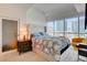 Relaxing main bedroom with skyline views, plush bedding, and modern furnishings at 4525 Dean Martin Dr # 901, Las Vegas, NV 89103