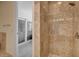 The custom shower features gorgeous tile and a seamless glass door at 4525 Dean Martin Dr # 901, Las Vegas, NV 89103