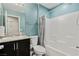 Bathroom featuring a vanity with granite countertop, toilet, and shower/tub combination with white tile at 4559 Dover Straight St, Las Vegas, NV 89115