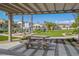 Community park featuring picnic tables under shaded structure and lush green lawns at 4559 Dover Straight St, Las Vegas, NV 89115
