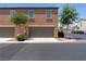 Attached two-car garage with ample parking space and well maintained landscaping at 4559 Dover Straight St, Las Vegas, NV 89115