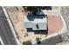Aerial view of a property showing the roof, surrounding yard, and street access on a corner lot at 4629 San Cir, Las Vegas, NV 89120