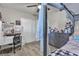 Well-lit bedroom featuring a ceiling fan, desk, drawers, and a unique canopy over the bed at 4629 San Cir, Las Vegas, NV 89120