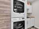 A modern, stacked washer and dryer add character to the laundry area at 4629 San Cir, Las Vegas, NV 89120
