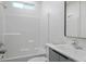 Clean bathroom with a shower over tub, modern vanity, and bright lighting at 4797 E Imperial Ave, Las Vegas, NV 89104