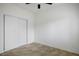 Cozy bedroom with closet, tile flooring, and neutral walls at 4797 E Imperial Ave, Las Vegas, NV 89104