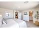 Spacious main bedroom featuring a walk-in closet, neutral decor, and access to an ensuite bathroom at 4955 Sage Mesa Ave # Lot 150, Las Vegas, NV 89139