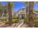 Exterior view of the community clubhouse with lush landscaping at 4960 Harrison Dr # 214, Las Vegas, NV 89120