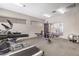 Community gym featuring a treadmill, stationary bike, and weightlifting equipment at 4960 Harrison Dr # 214, Las Vegas, NV 89120