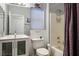 This bathroom includes a shower/tub combo, a vanity, and lots of natural light at 499 Eagle Vista Dr, Henderson, NV 89012