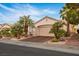 Charming single-story home featuring a two-car garage, desert landscaping and inviting curb appeal at 499 Eagle Vista Dr, Henderson, NV 89012