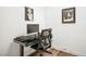 The home office features a modern desk, a comfortable office chair, and lots of light at 499 Eagle Vista Dr, Henderson, NV 89012
