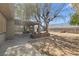 A back yard with trees and a patio at 5101 Churchill Ave, Las Vegas, NV 89107