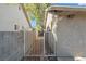 Gated side yard featuring privacy wall and potential for storage at 5101 Churchill Ave, Las Vegas, NV 89107