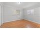 Inviting bedroom with wood floors, natural light, and neutral walls offers a serene retreat at 5101 Churchill Ave, Las Vegas, NV 89107