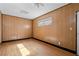 Bedroom featuring wood paneling and flooring, creating a rustic and cozy feel at 5101 Churchill Ave, Las Vegas, NV 89107