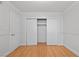 Cozy bedroom with wood floors and a spacious closet, offering a blank canvas for personalization at 5101 Churchill Ave, Las Vegas, NV 89107