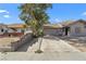 Exterior of a home showing a long driveway leading to the house at 5101 Churchill Ave, Las Vegas, NV 89107