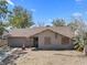 Charming single-story home features a neutral exterior, a brick pathway, and a tidy roofline at 5101 Churchill Ave, Las Vegas, NV 89107