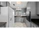 Traditional kitchen with gray cabinets and stainless steel appliances at 5101 Churchill Ave, Las Vegas, NV 89107