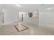 Bright and spacious living room featuring tile floors and neutral paint, ready for your personal touch at 5101 Churchill Ave, Las Vegas, NV 89107