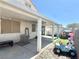 The backyard features a covered patio and a small playhouse at 529 Regal Robin Way, North Las Vegas, NV 89084