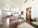 Spacious living room with tile floors, neutral decor, and lots of natural light at 529 Regal Robin Way, North Las Vegas, NV 89084